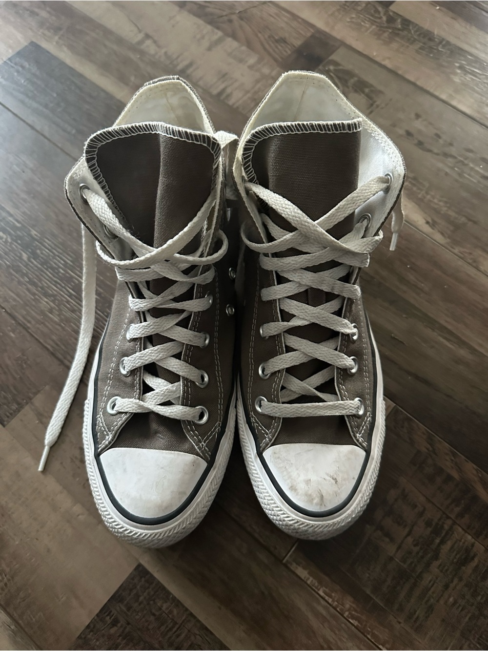Greyish / brownish high top converse